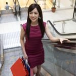 woman on escalator