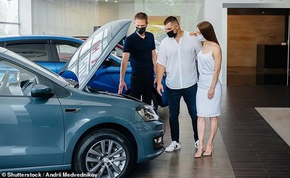 couple at Car showroom