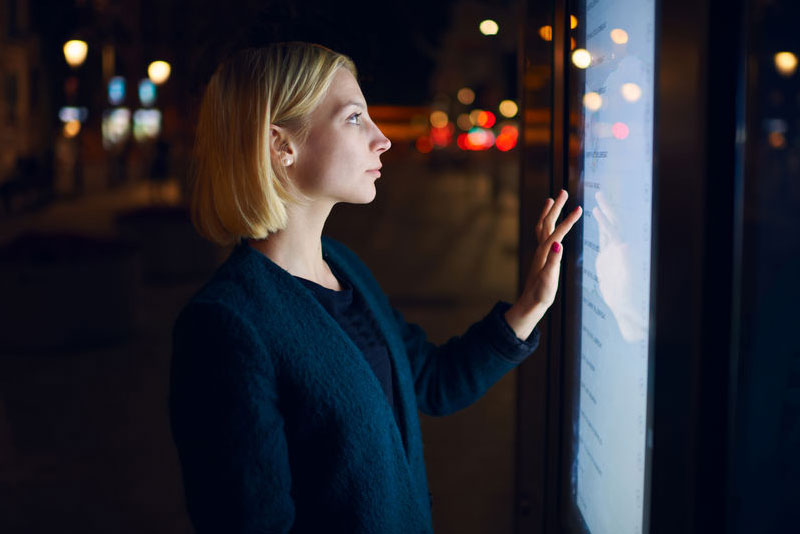 Blonde Woman in blue sweater