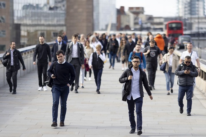 UK pay growth slows down ahead of interest rate hike