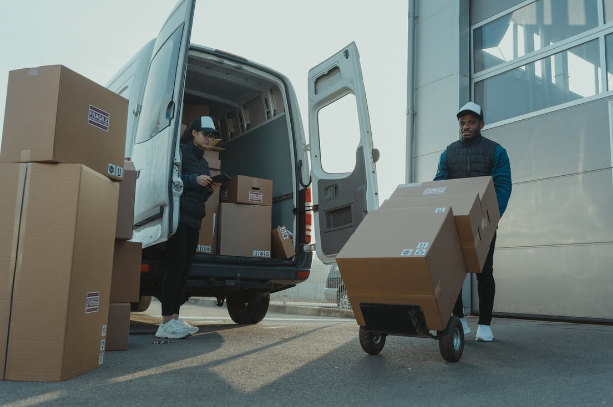 Delivery guys unloading the van