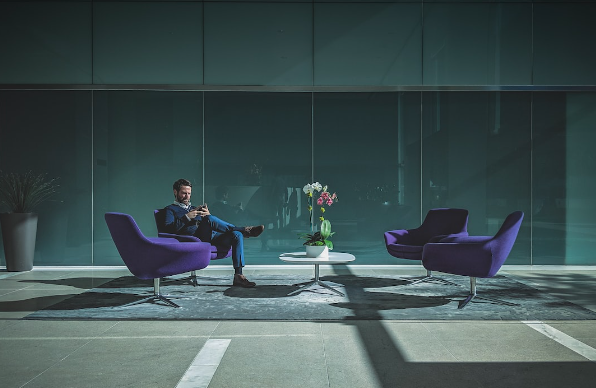 How Corporate Events Contribute to Business Innovation and Creativity 2 sitting in business lounge