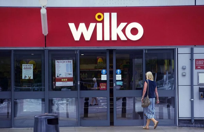 woman walking into Wilko