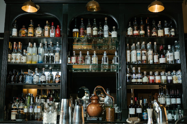 bottles on a wooden shelf