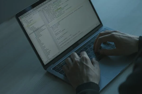 man using laptop to read emails
 