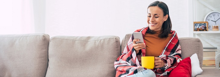 woman sitting on sofa